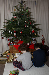 kids opening Christmas presents photo